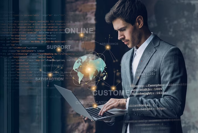 Man Working On Laptop While Standing