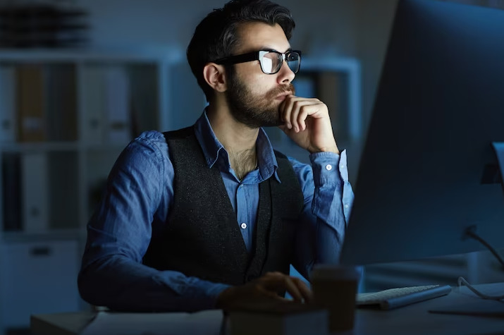 Man Working Infront of Computer